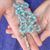 Crystal Blue Rosary in hand